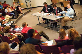 Crownpoint High School Principle George Bickert speaks during a panel discussion at the University of New Mexico-Gallup on Friday afternoon. The Four Corners Education Summit was sponsored by Teach for America and saw about 200 educators attend. © 2011 Gallup Independent / Brian Leddy 